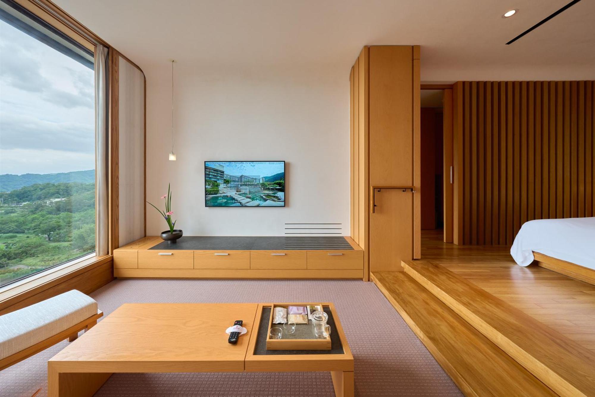 โรงแรมรอยัล เจียว ซี เจียวซี ภายนอก รูปภาพ A room at the hotel