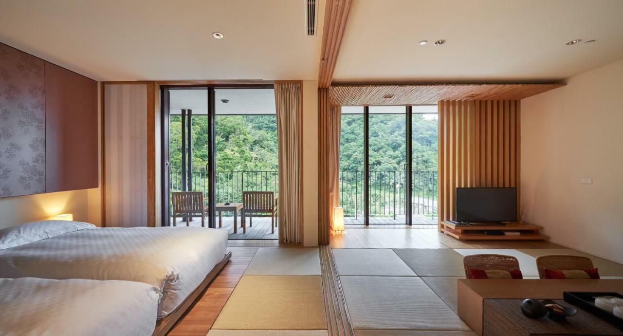 โรงแรมรอยัล เจียว ซี เจียวซี ภายนอก รูปภาพ A room at the hotel
