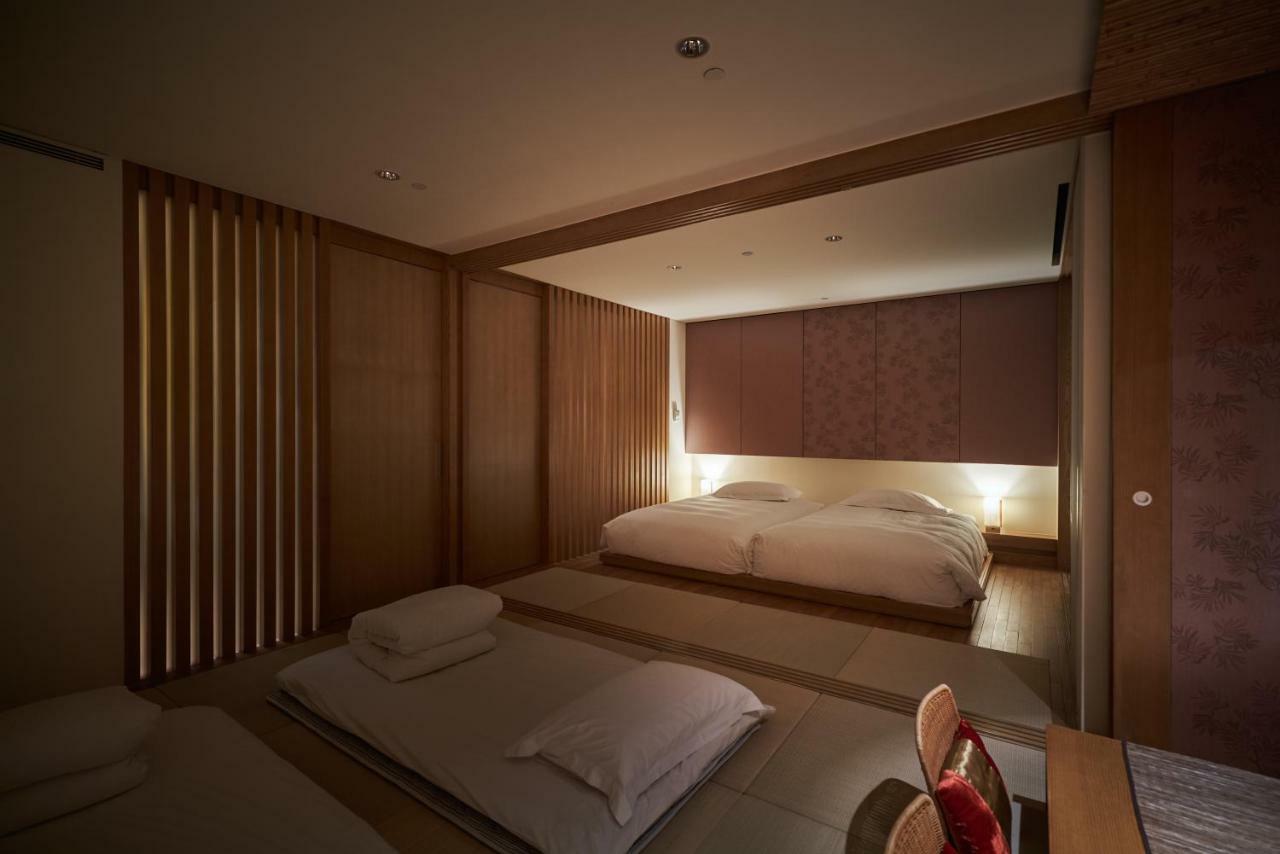 โรงแรมรอยัล เจียว ซี เจียวซี ภายนอก รูปภาพ A room at the hotel